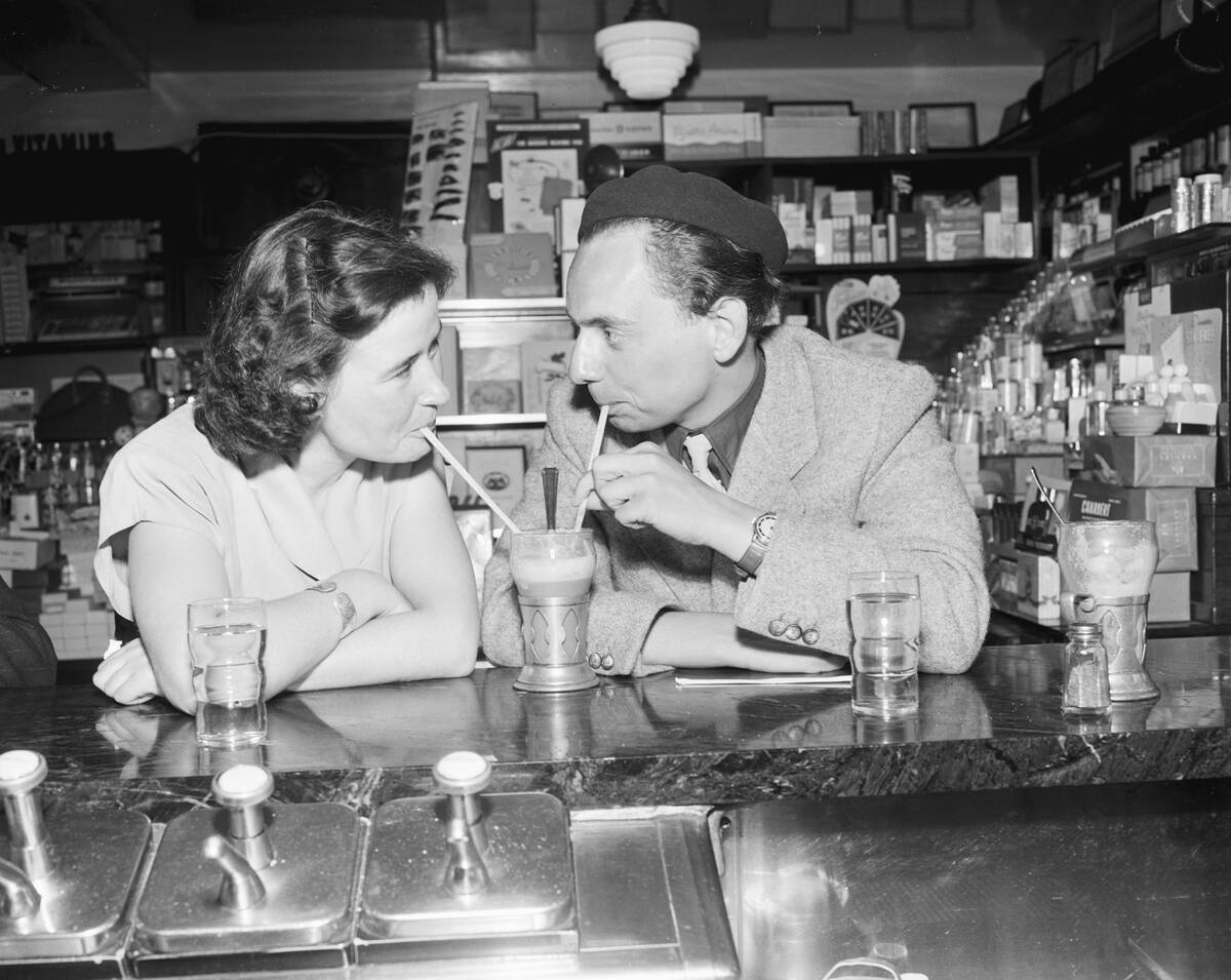 Couple Sharing Ice Cream Soda