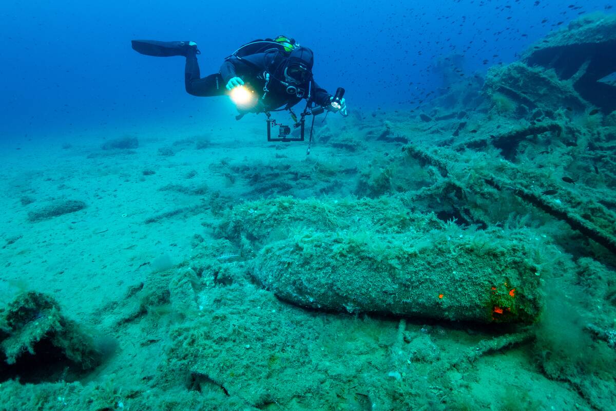 Divers dive into shipwreck on the coast of Canakkale within the 30 August Victory Day