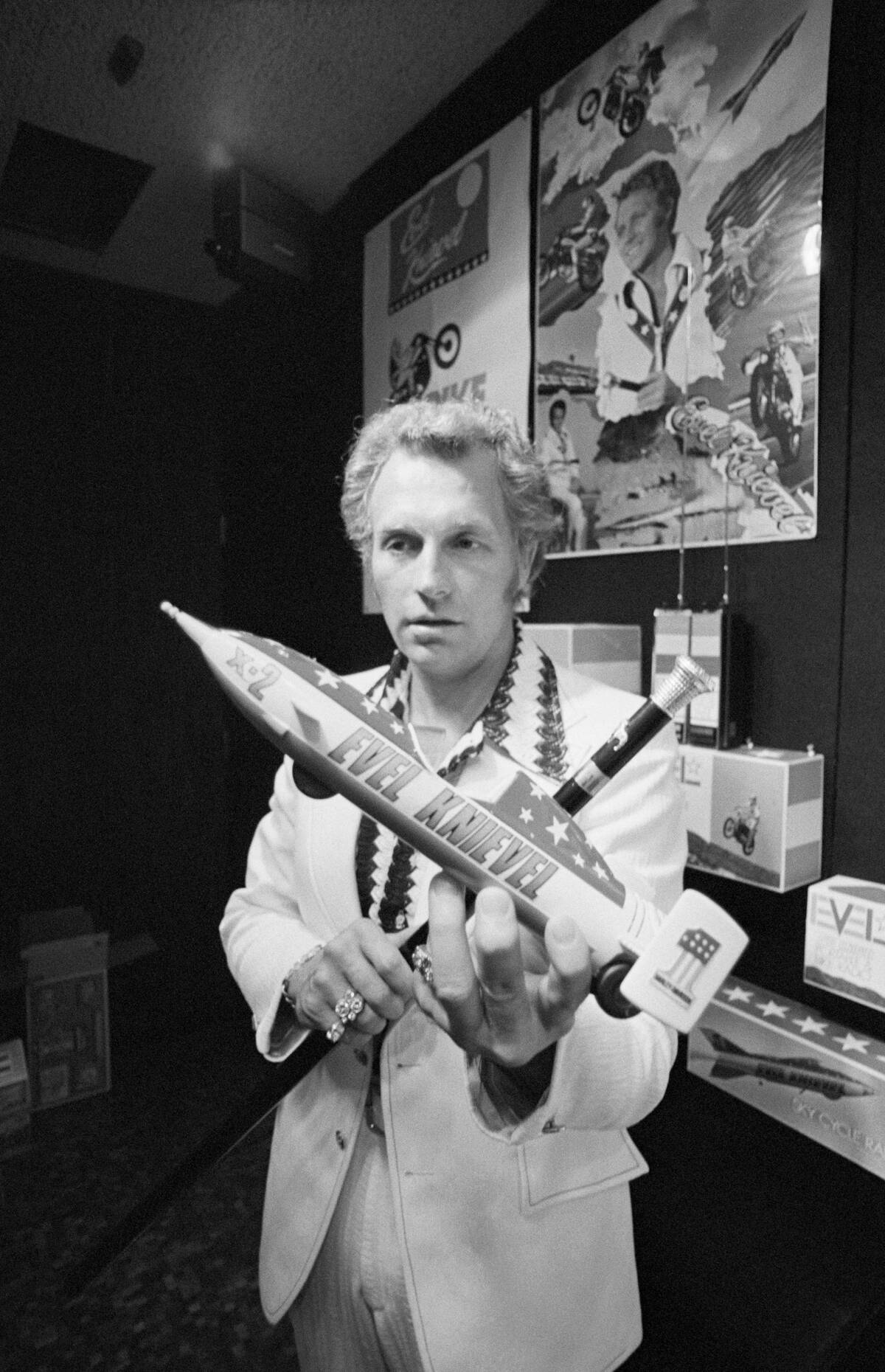 Evel Knievel Displaying a Model