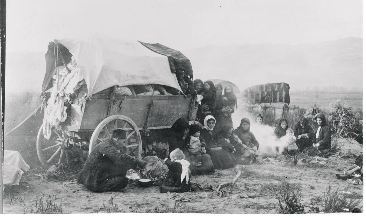 Family at Wagon During Trek