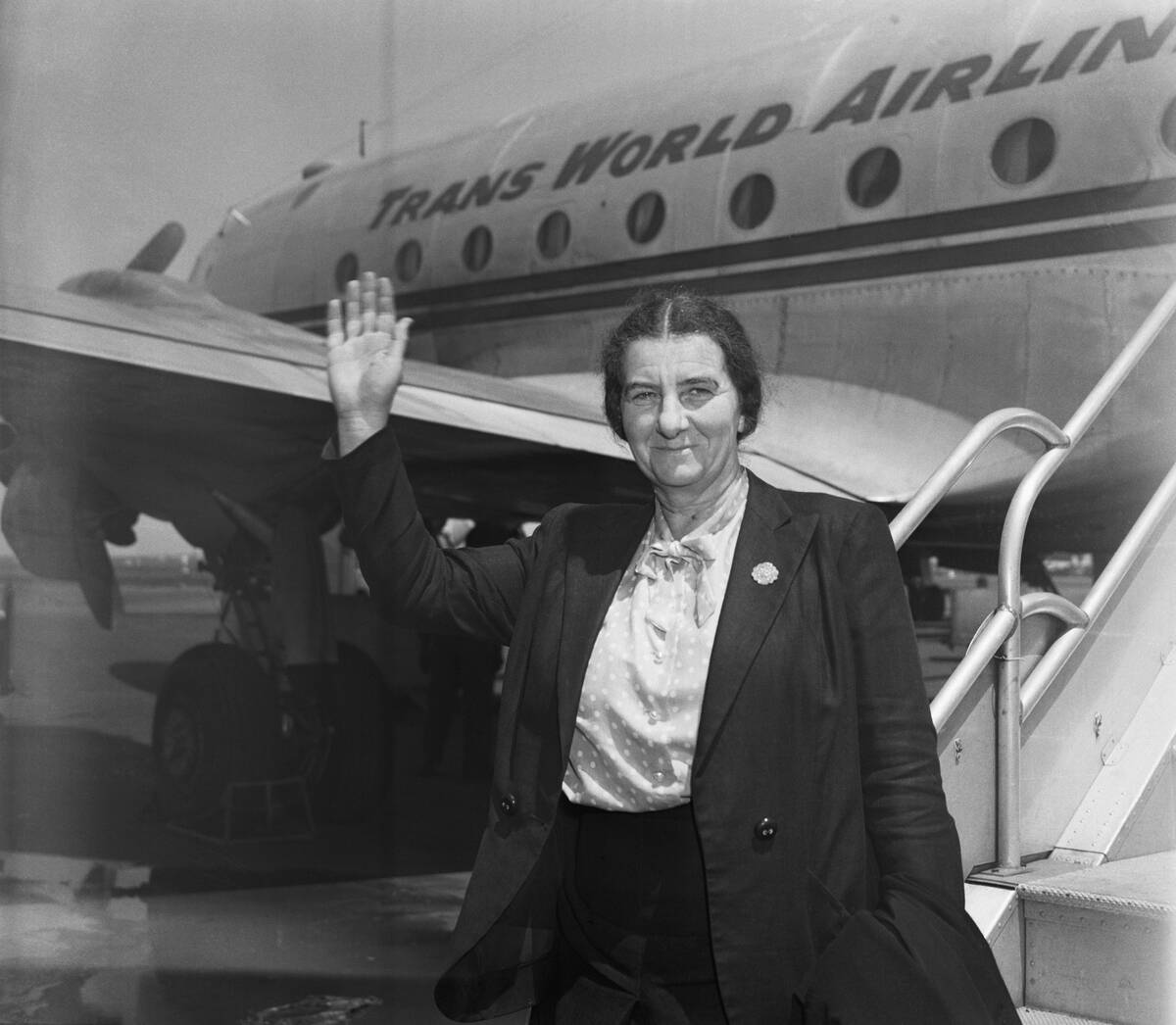 Golda Meir Waving Beside Plane