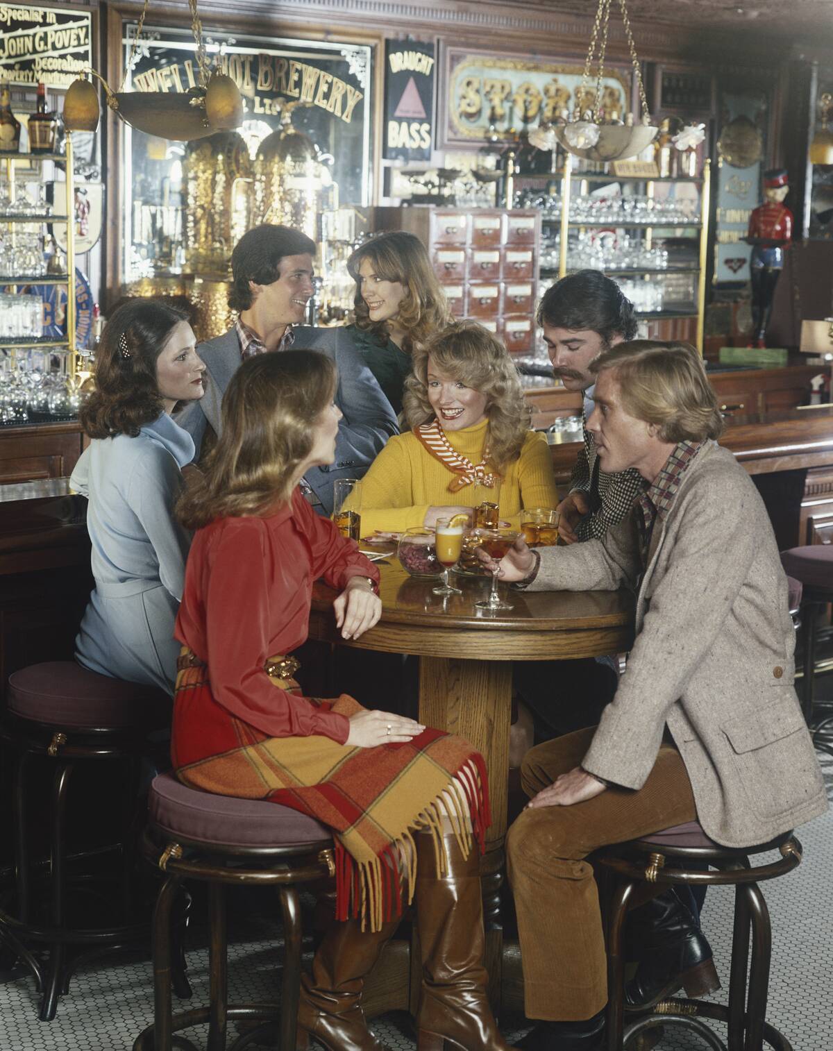 Group of people sitting in bar