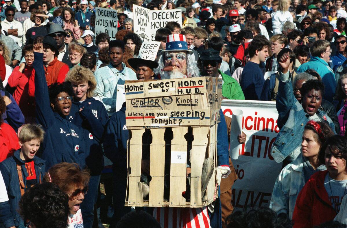 Homeless Protesters Marching with Signs and Banners