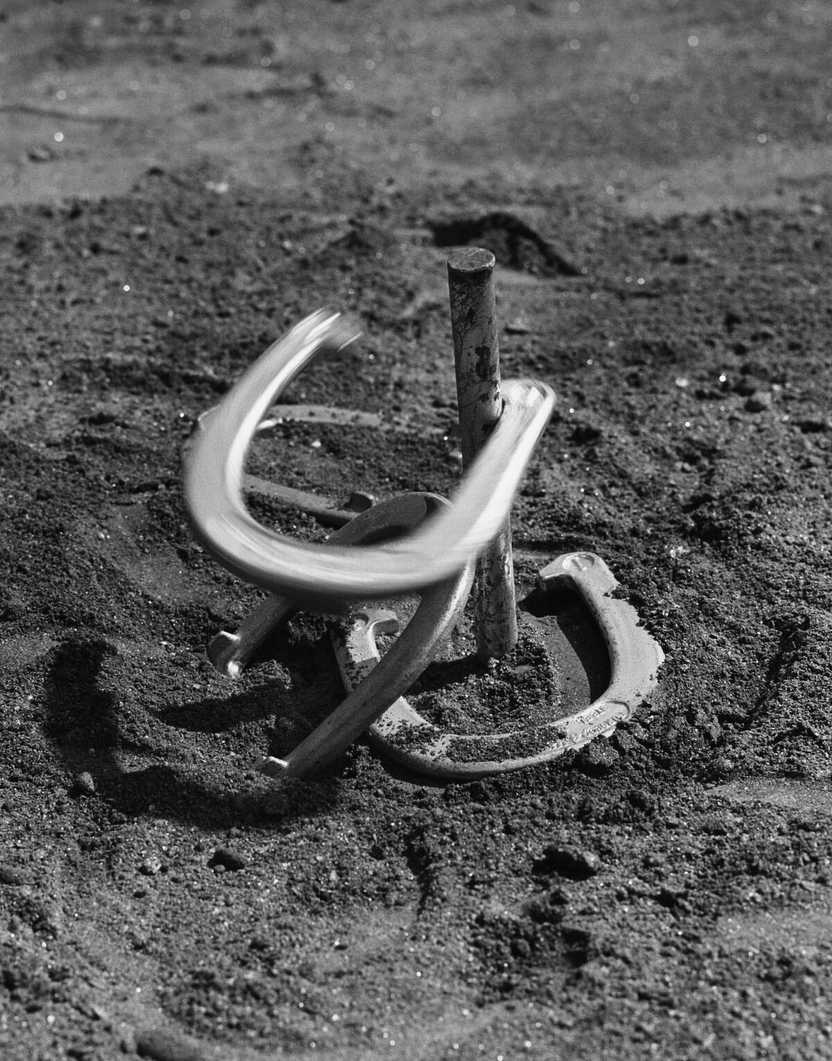 HORSESHOES IN SAND PIT