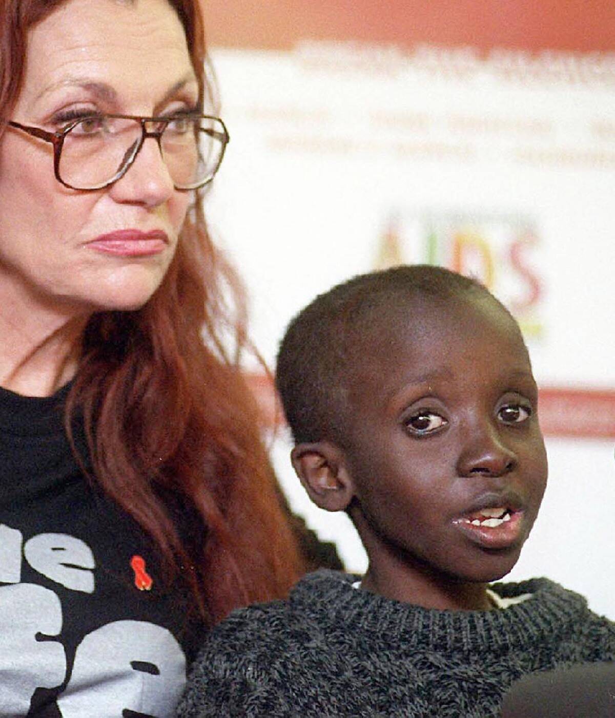 II year old Hiv-Positive Nkosi Johnson (R) accomp