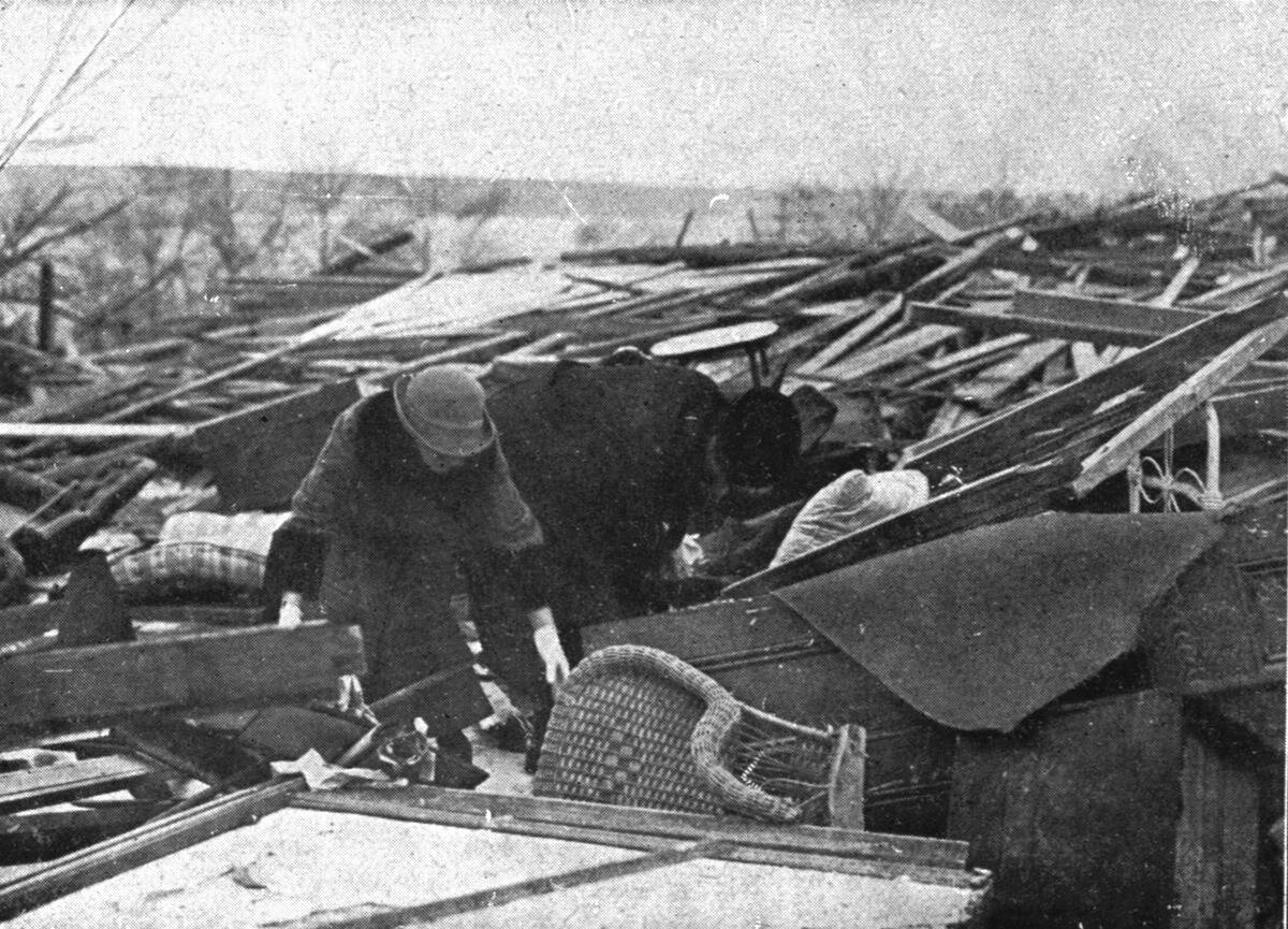 In Canada: The Halifax Explosion; People Search Among The Ruins Of Their Houses