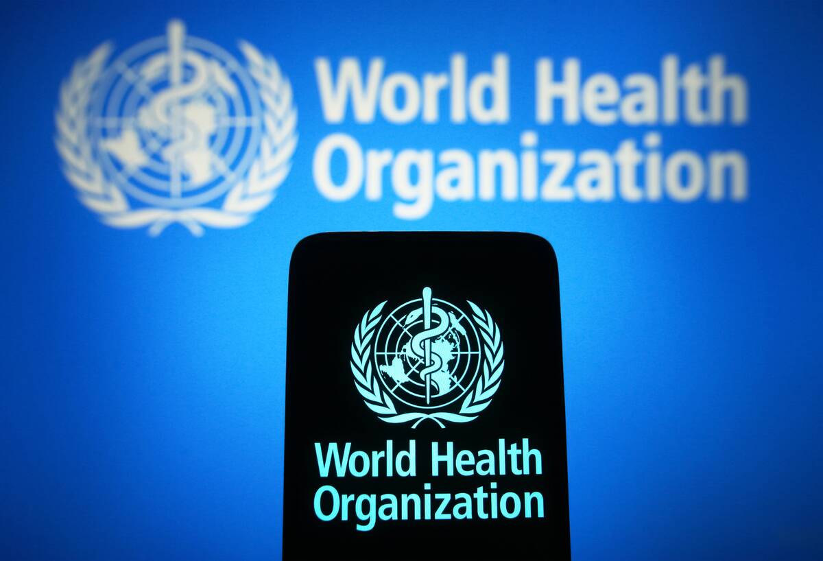 In this photo illustration, the World Health Organization (...