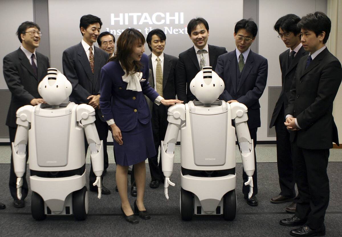 Japanese Electronics Conglomerate Hitachis New Humaniod Robot 'Emiew'