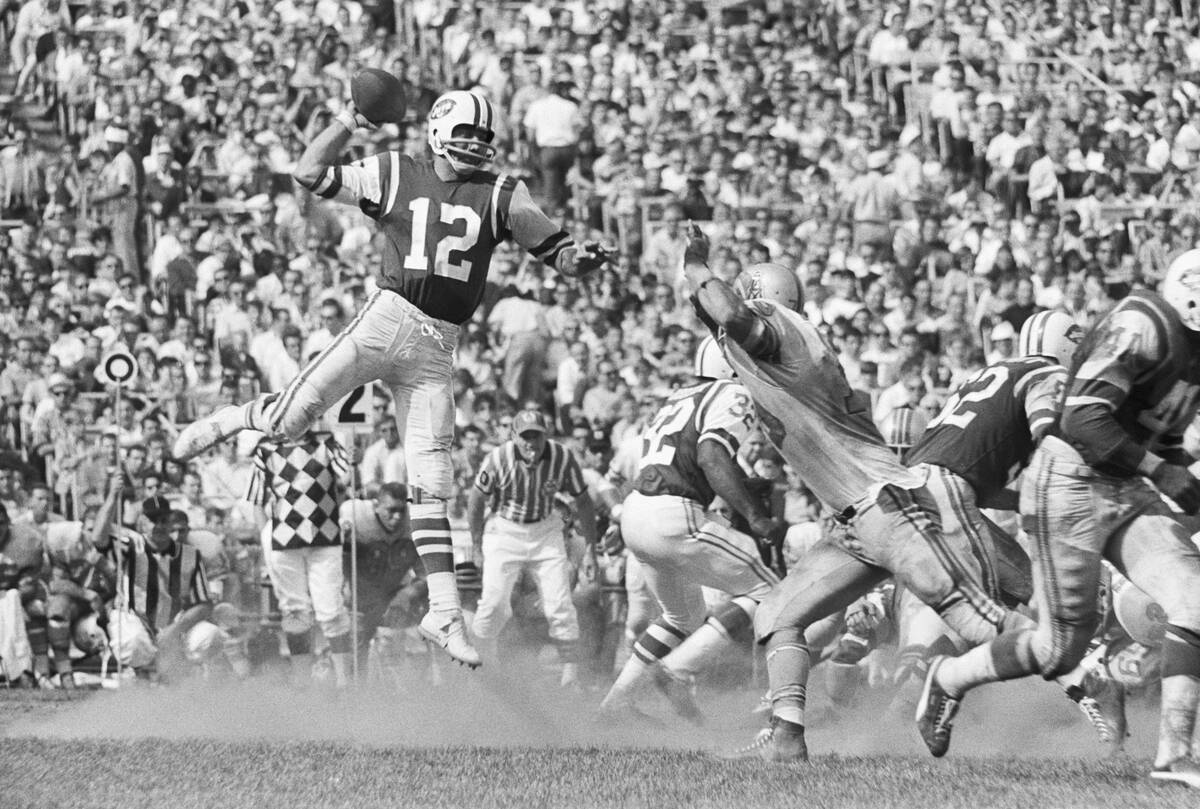 Joe Namath Leaps to Throw Pass