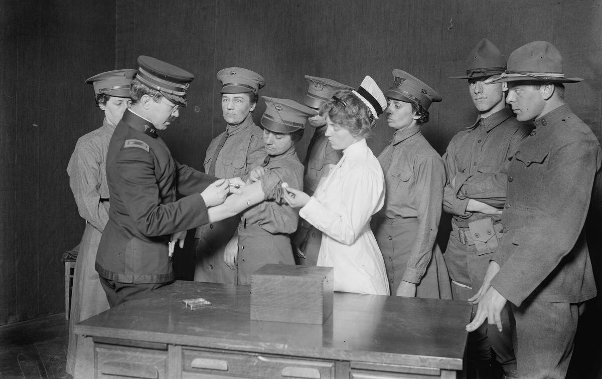Major Connell Inoculating Woman Motorist