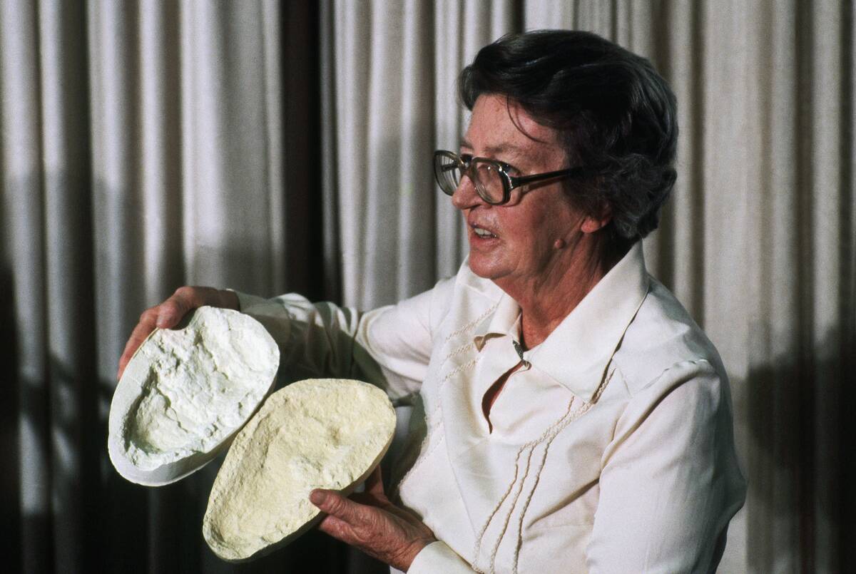 Mary Leakey Holding a Mold from a 3.6 Million Year Old Footprint