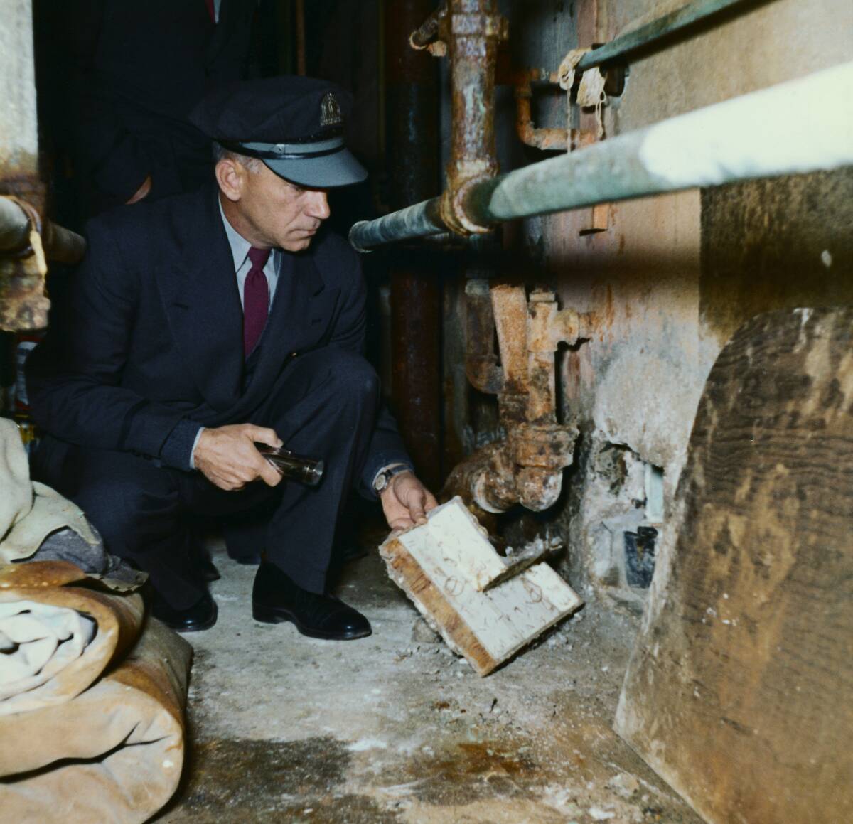 Officer Displaying Exit Used in Alcatraz Breakout