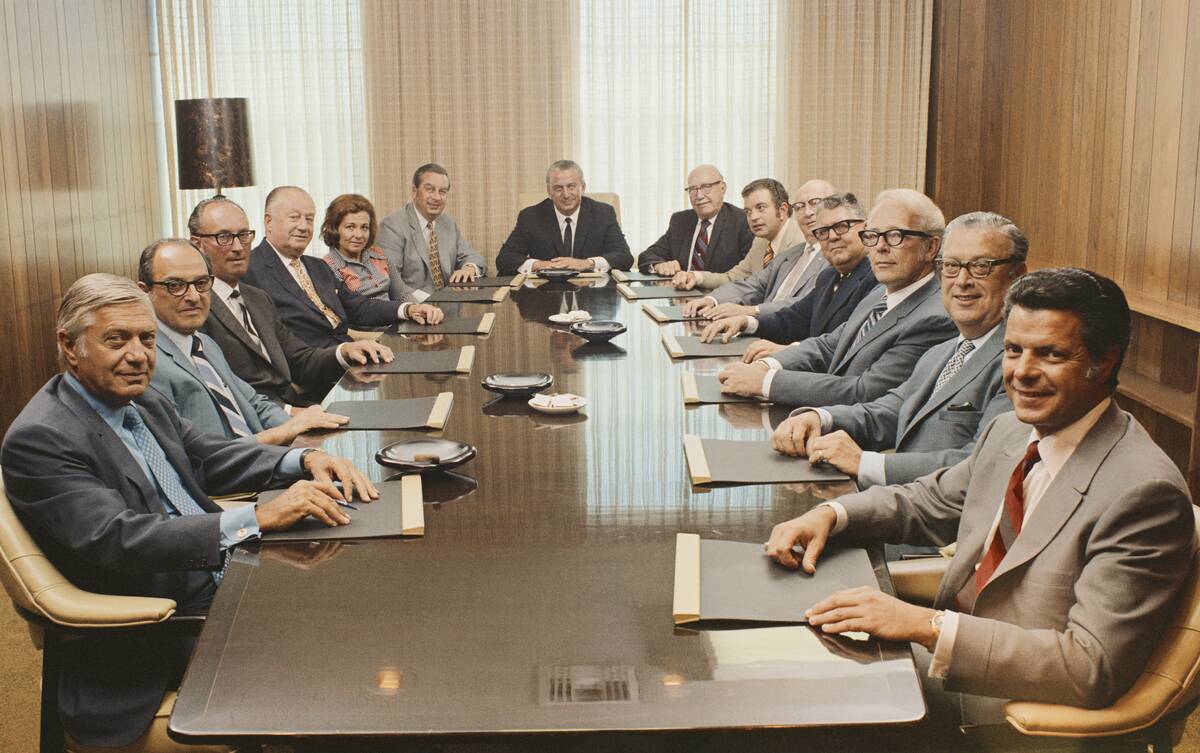 People sitting in conference room