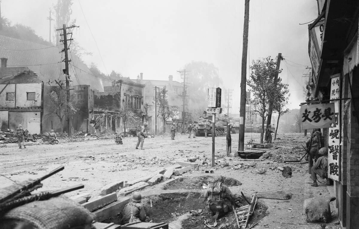 U. S. Soldiers Walking in War Torn Seoul Street