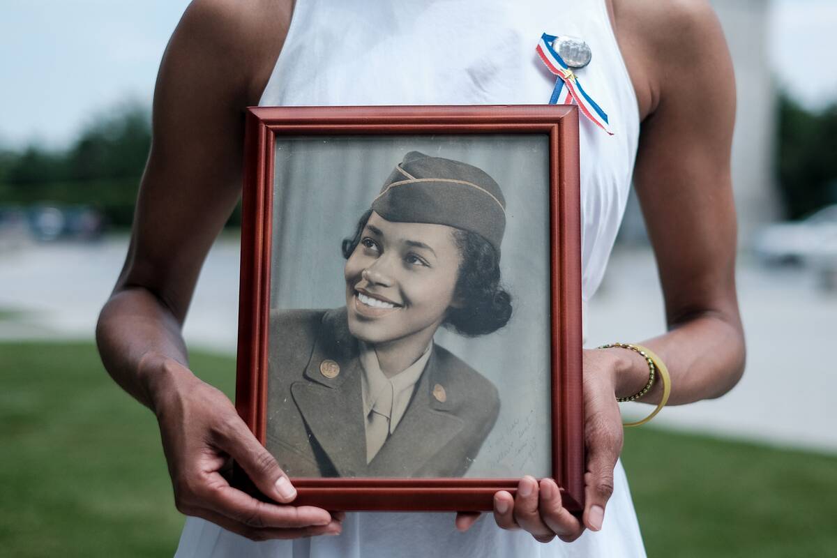 WASHINGTON, US - JUNE 15: Maia Semmes, holds a photograph of he