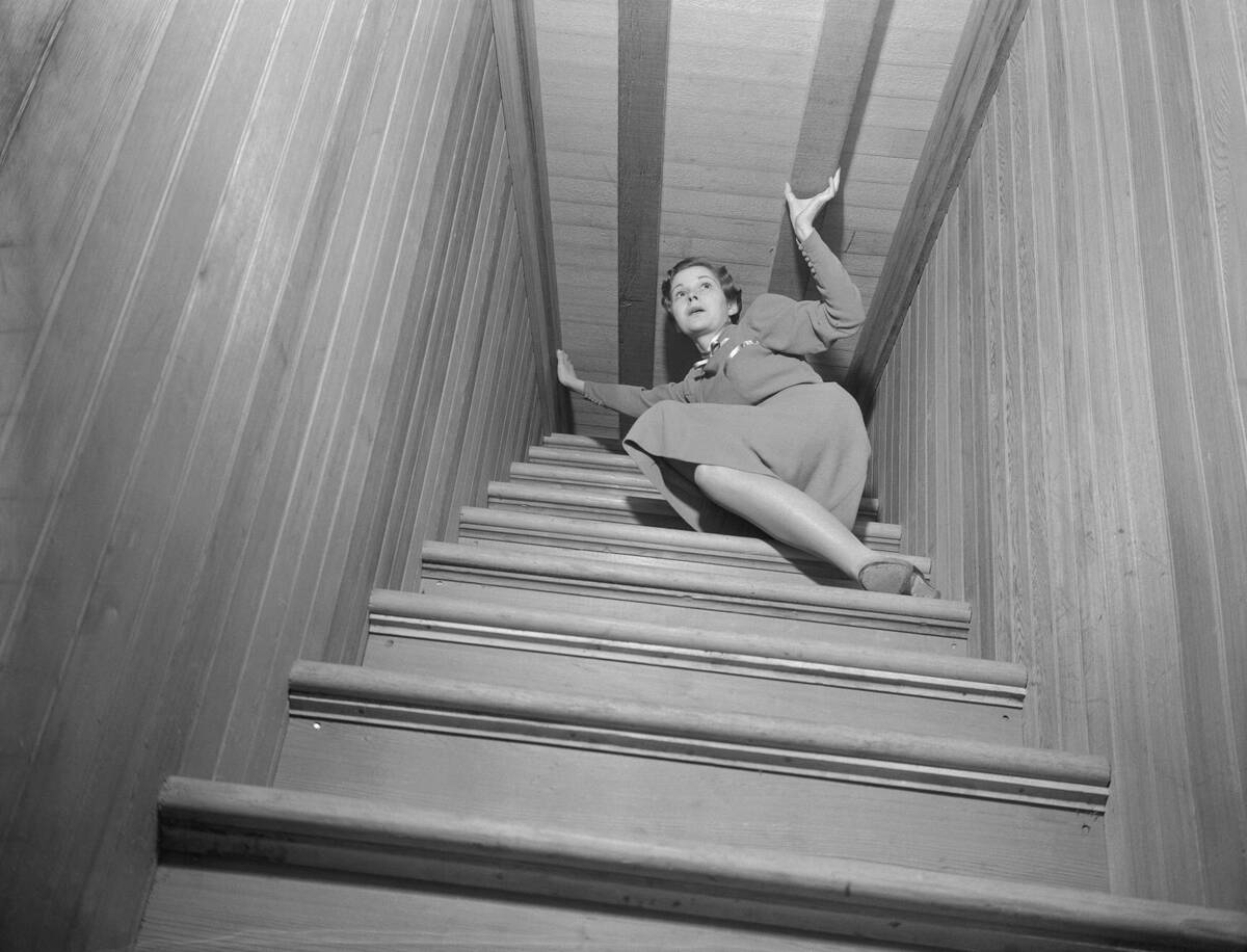 Woman on Narrow Staircase at Winchester Mystery House