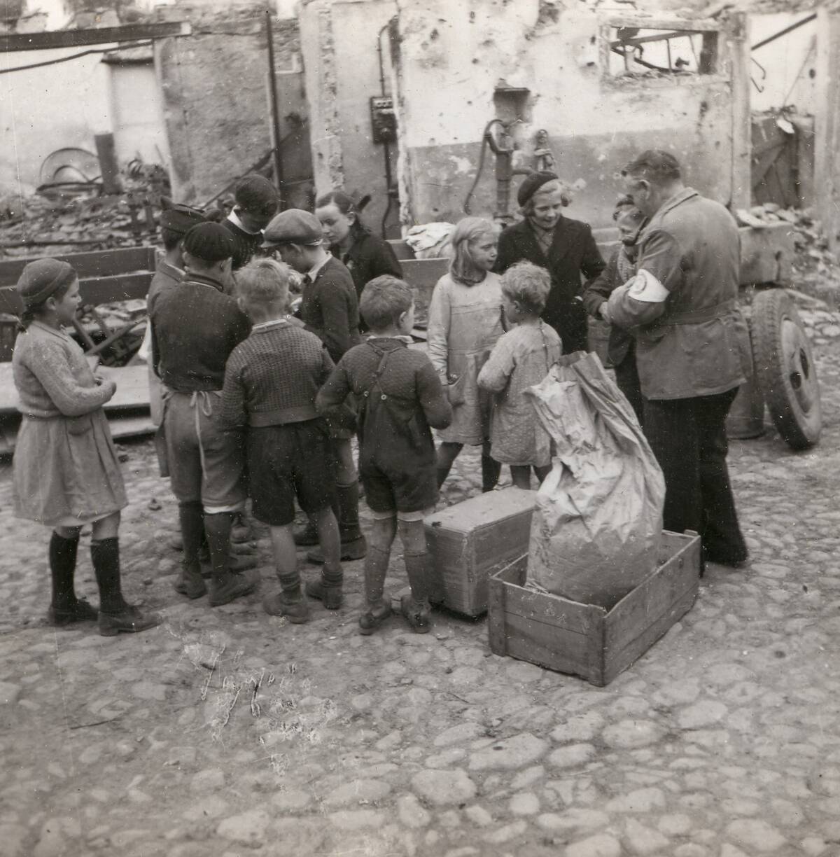 World War II. Distribution of food aid to the people of Ostheim