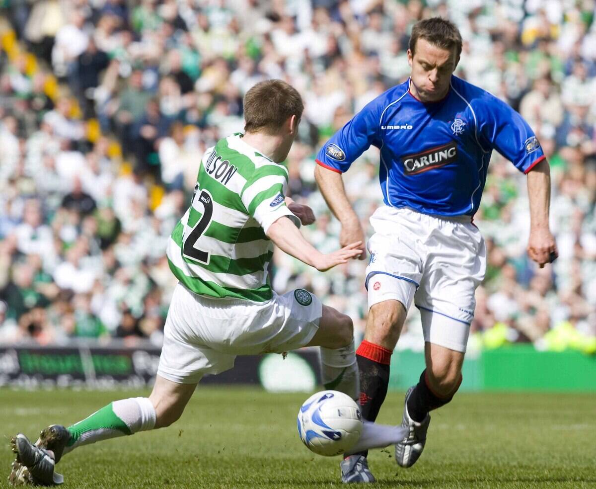 23/04/06 Spl .Celtic V Rangers (0-0) .Celtic Park - Glasgow .Mark Wilson (Left) Tackles Rangers Midfielder Gavin Rae In A Closely Fought Contest