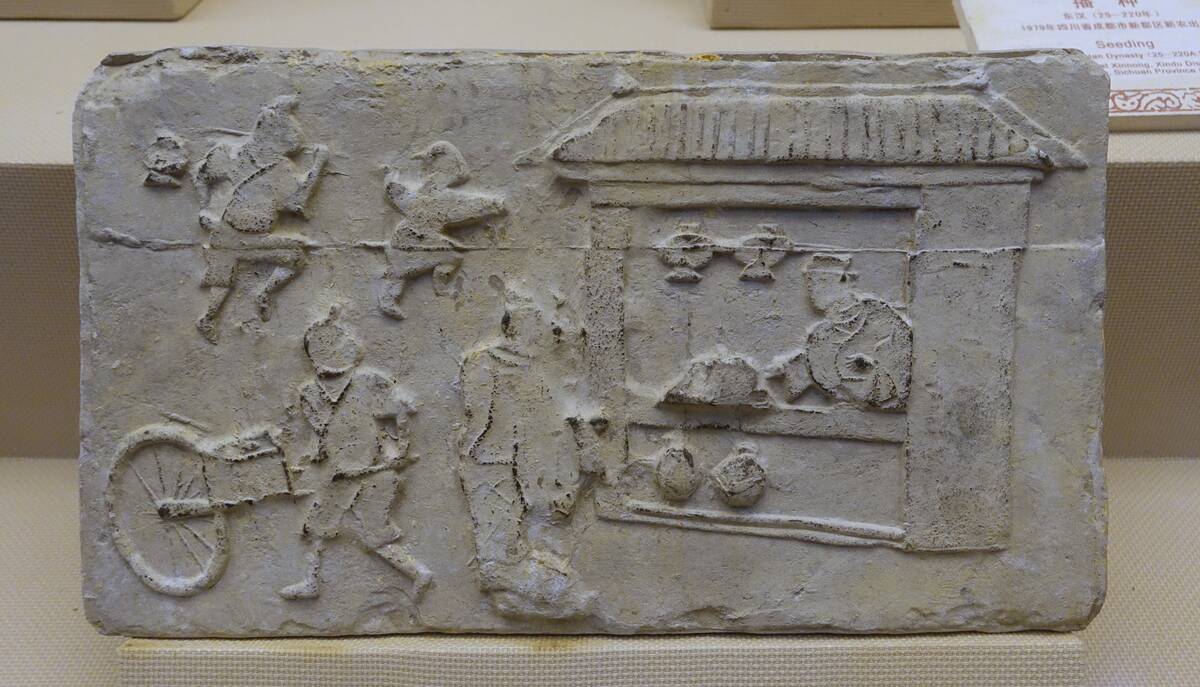 Wine_shop,_China,_collected_at_Yihe,_Pehgzhou_City,_Eastern_Han_dynasty,_25-220_AD,_tomb_tile_ Sichuan_Provincial_Museum_-_Chengdu,_China_-_DSC04779