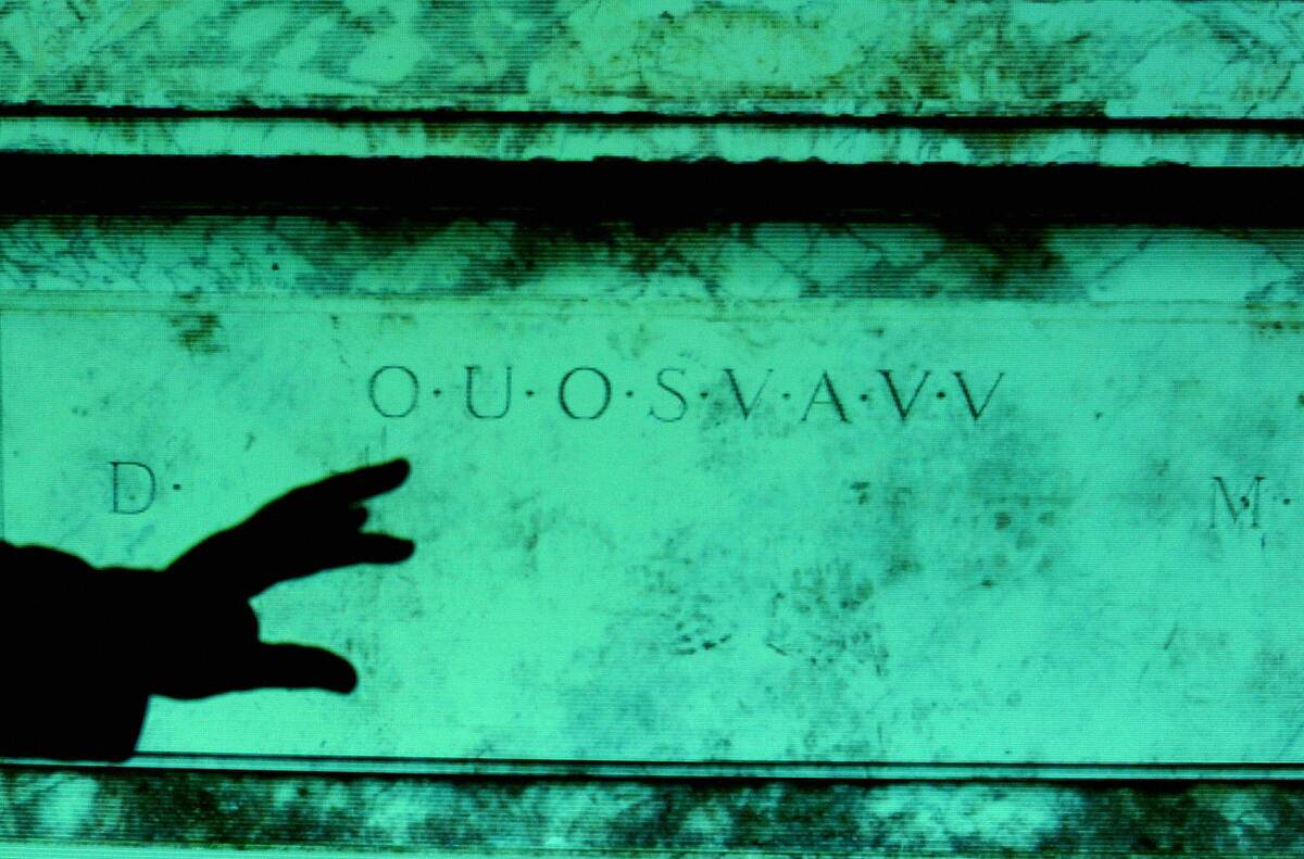 A slide shows the 250 year old coded ins