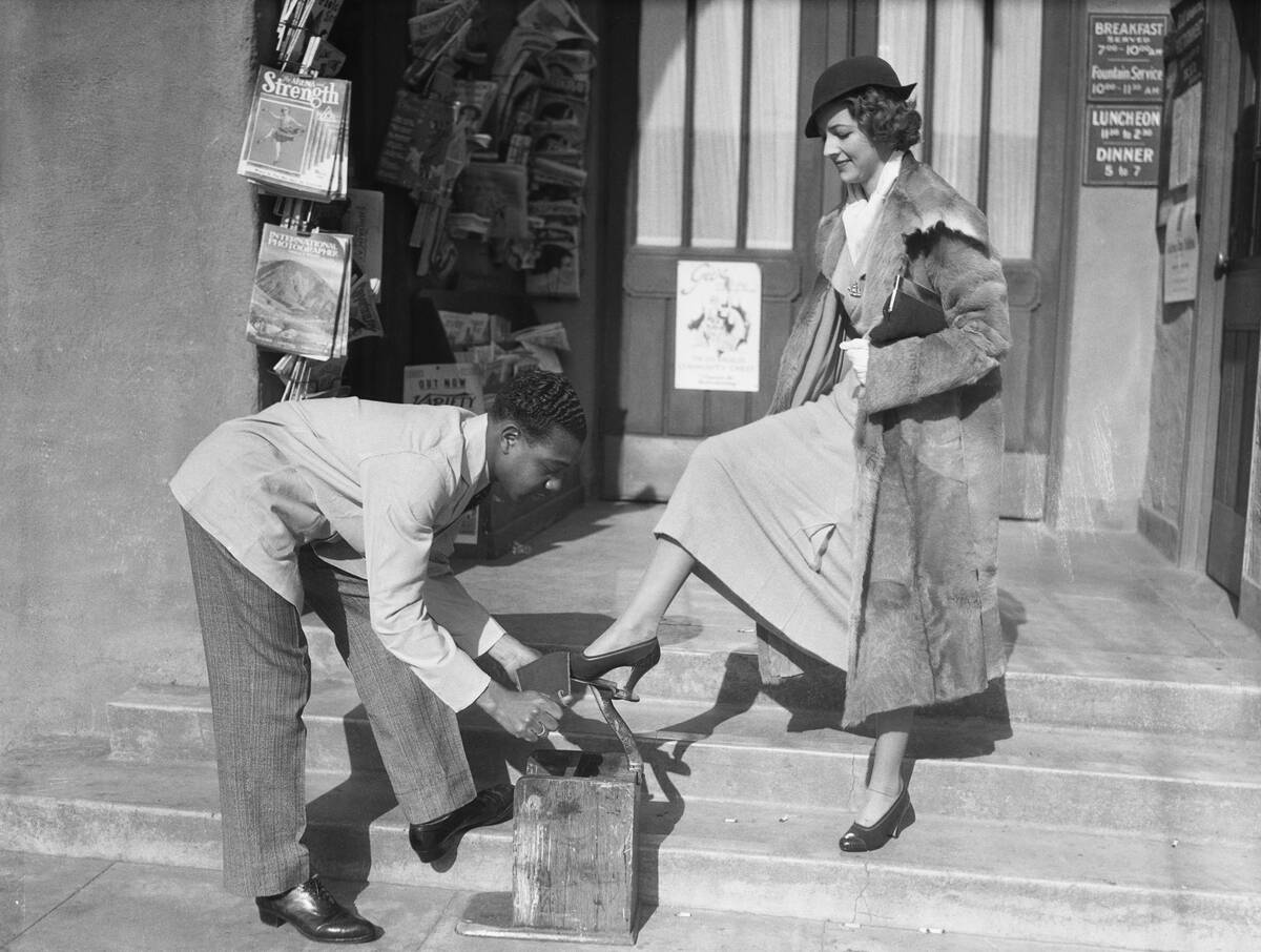 Actress Betty Furness at Rudy's Shoeshine Stand