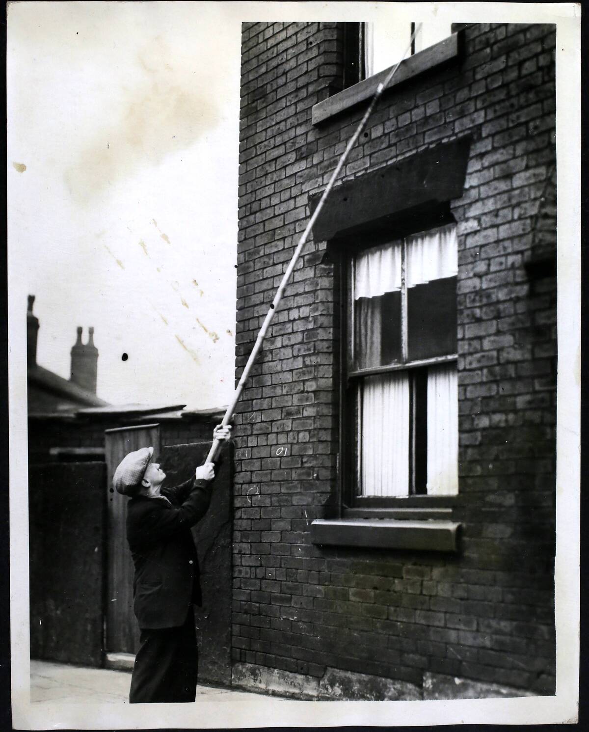 Alarm Clock Rouses Oldest Knocker -Up