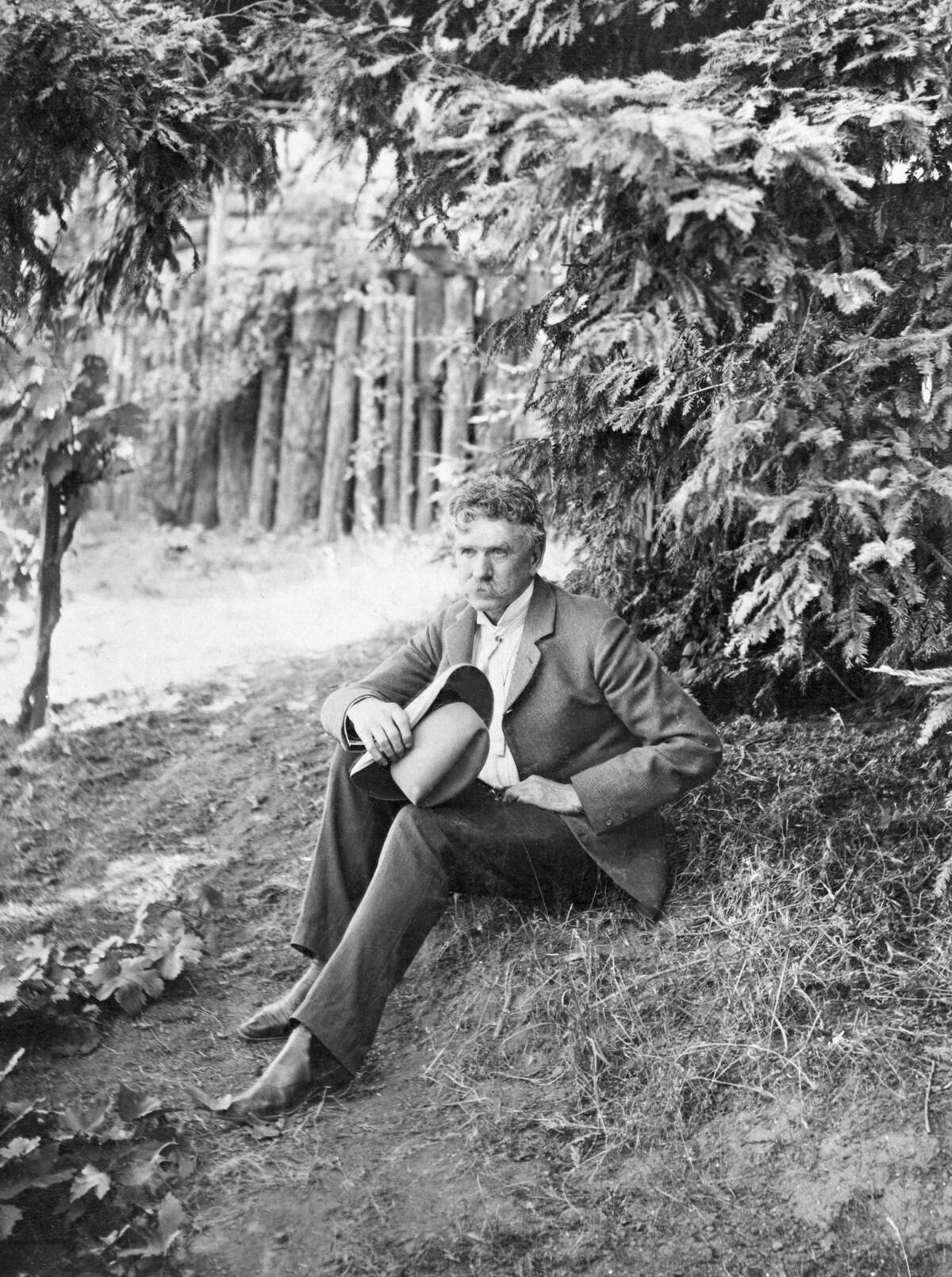 Ambrose Bierce Seated Under Tree
