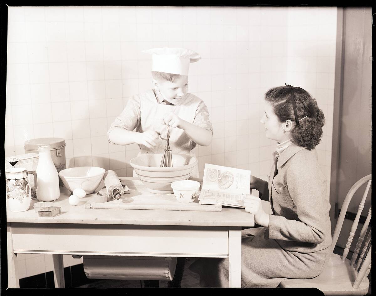 Boy Baking with His Mother