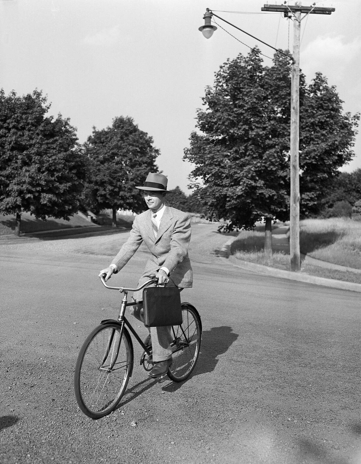 Business Man Riding Bicycle