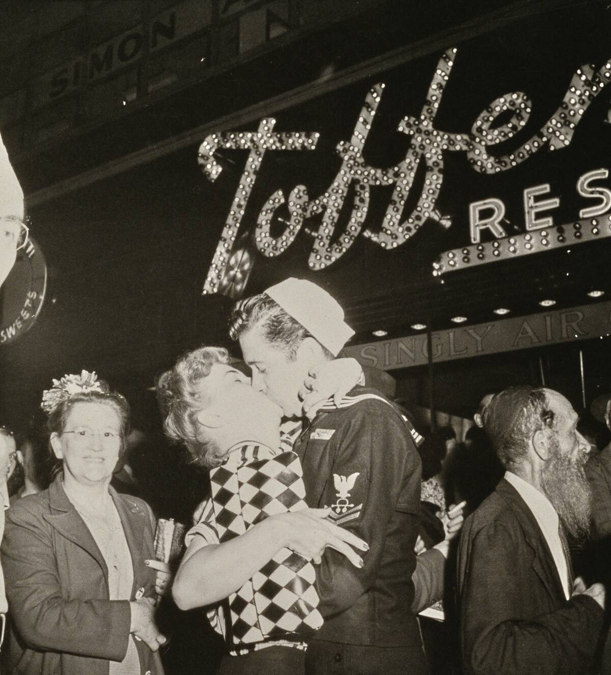 Celebratory Kiss In Times Square