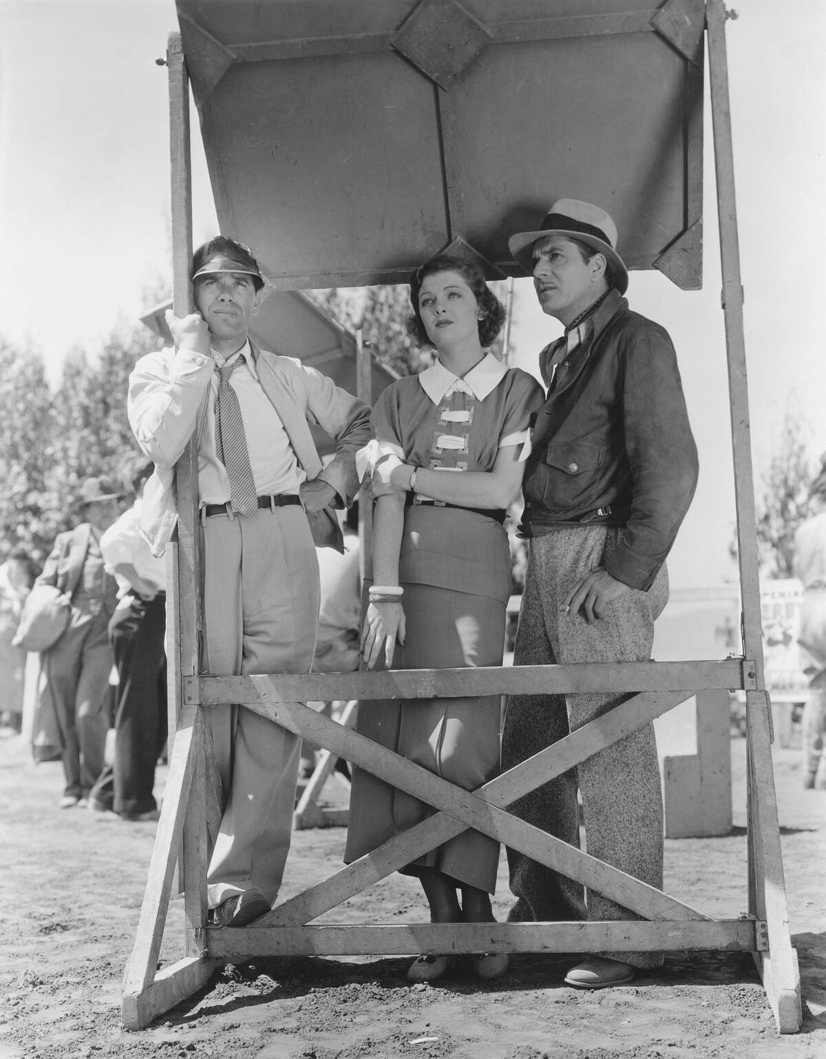 Frank Capra, Myrna Loy and Warner Baxter