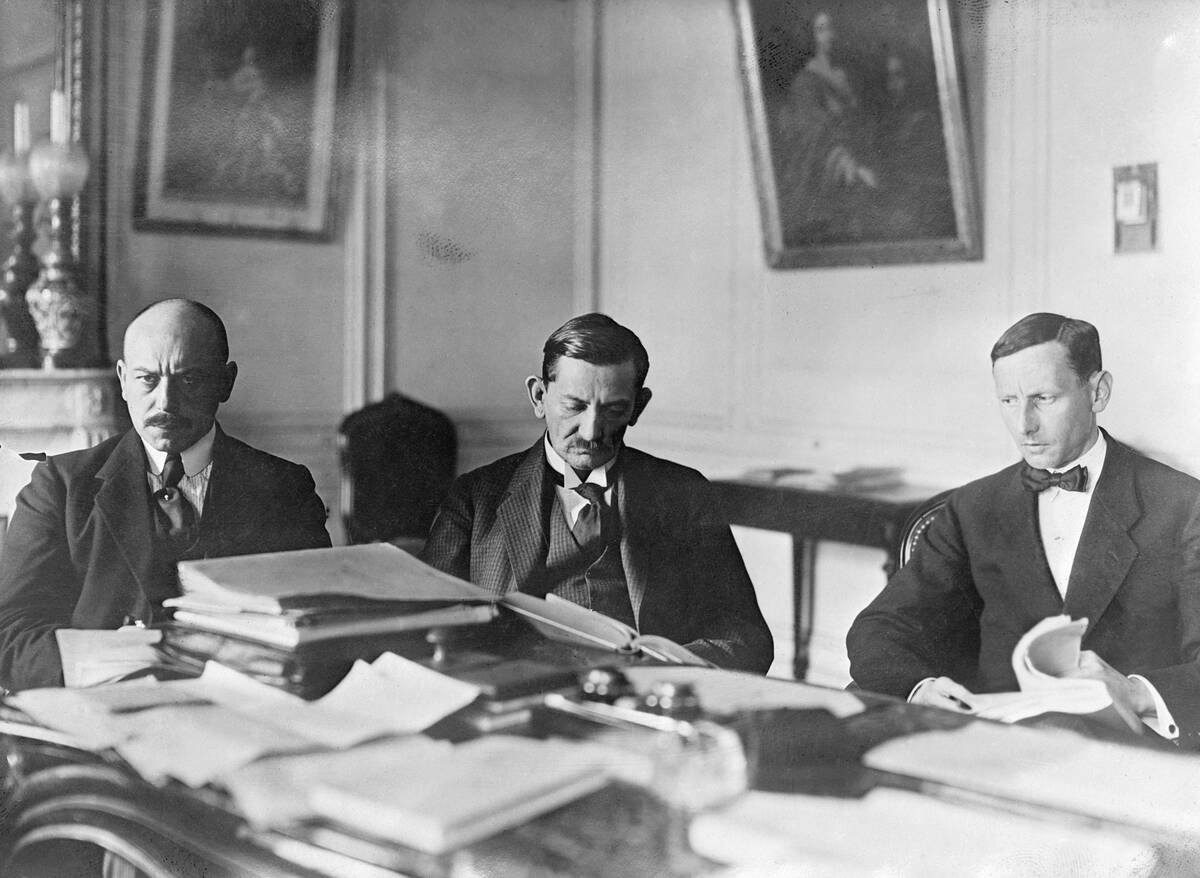 German Envoy Going Over Documents