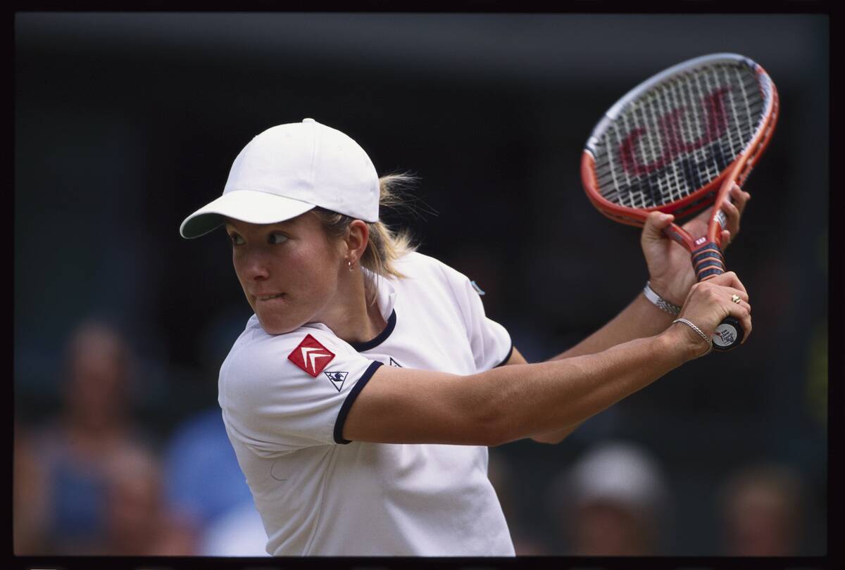 Justine Henin Playing a Match at Wimbledon
