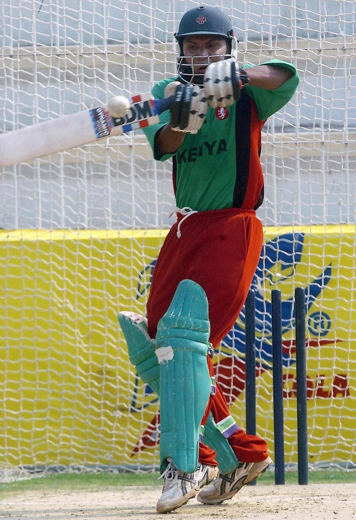 Kenyan cricketer Kalpesh Patel hits a ba