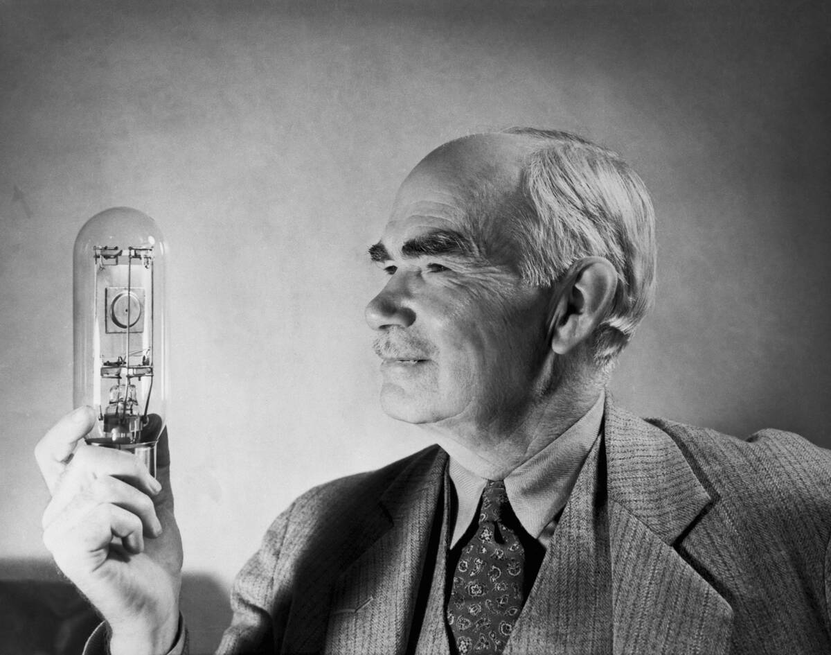 Lee Deforest Holding Audio Tube