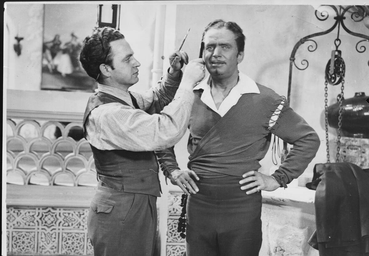 Man Applying Makeup to Douglas Fairbanks