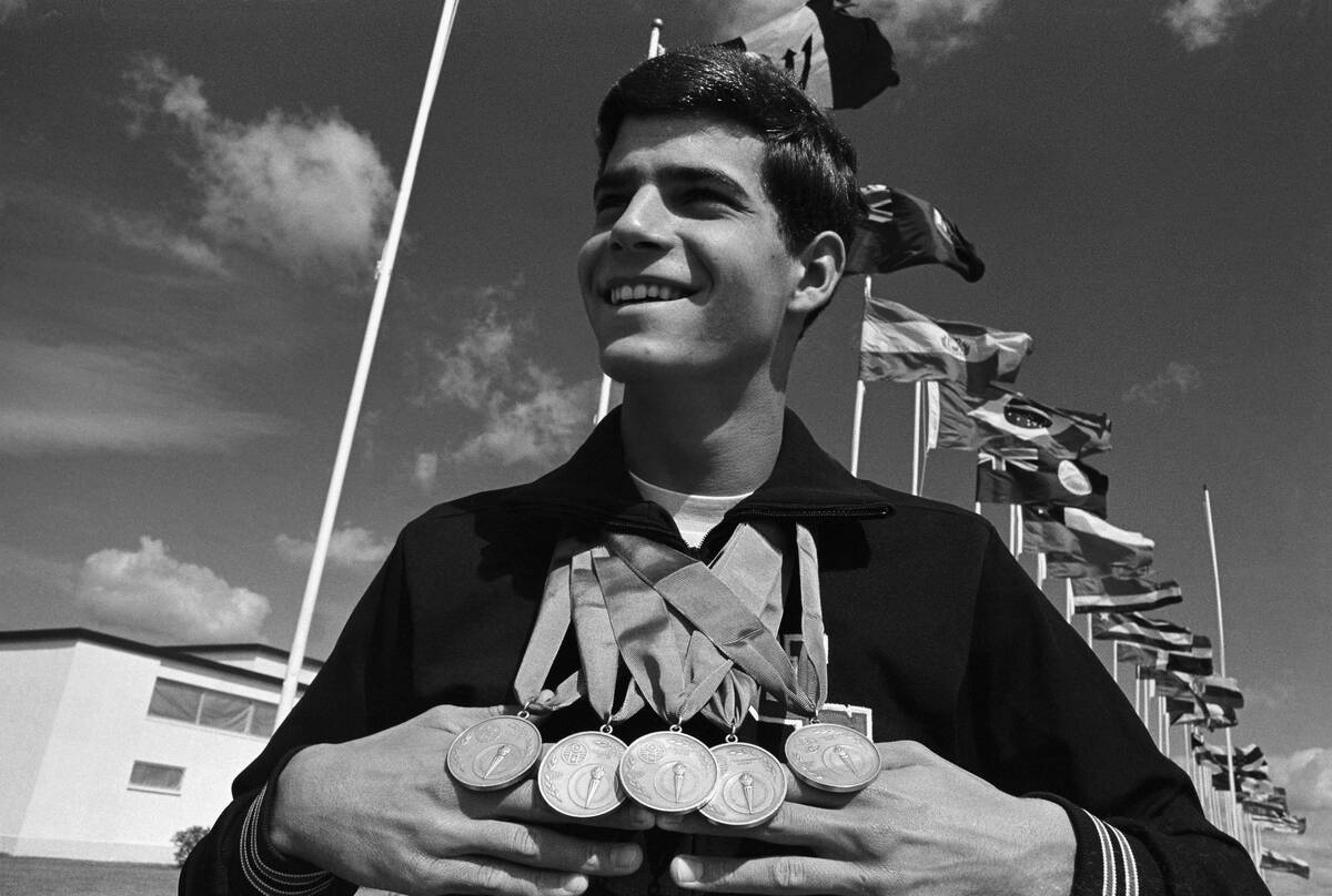 Mark Spitz Displaying Five Gold Medals