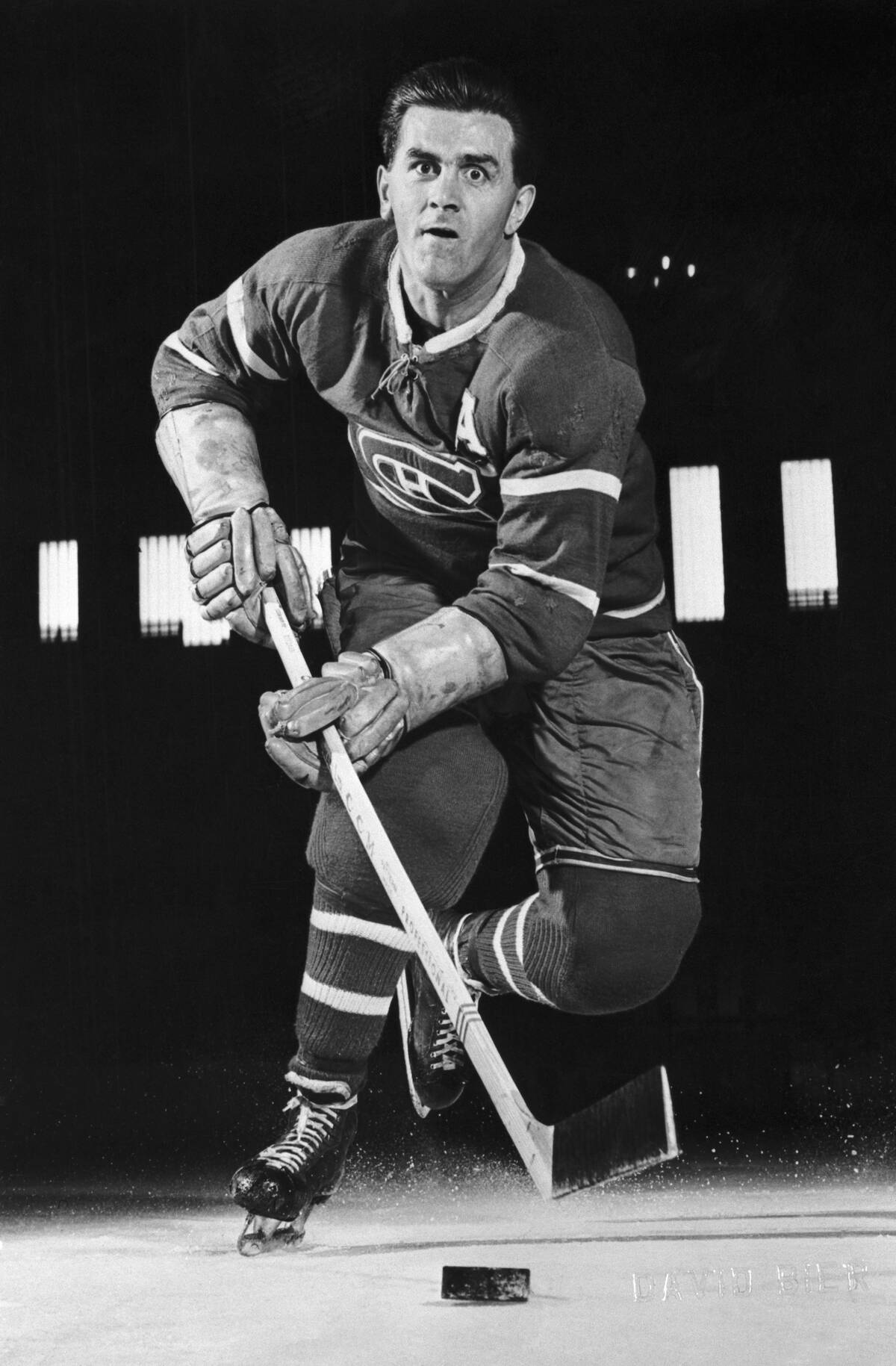 Maurice Richard with the Puck