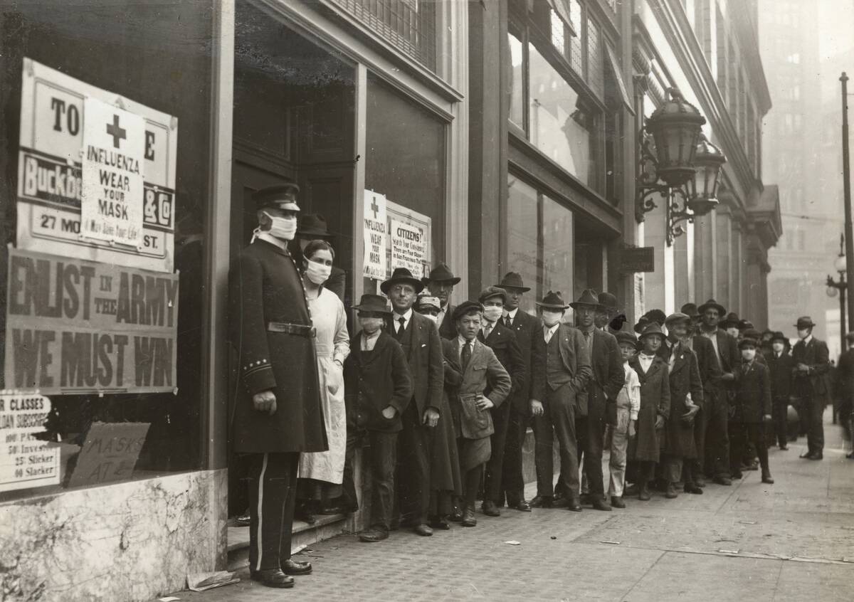 People Line Outside A Store To Buy Face Masks