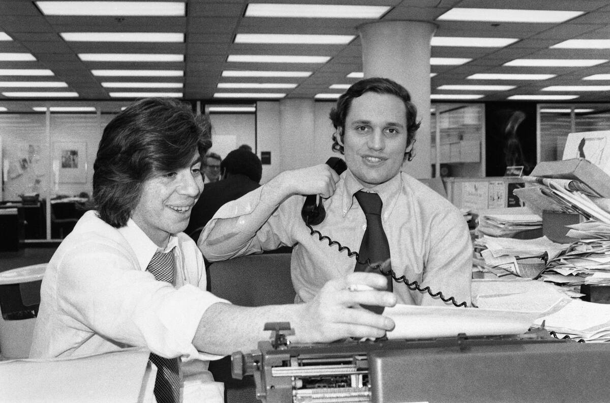 Reporters Carl Bernstein and Bob Woodward