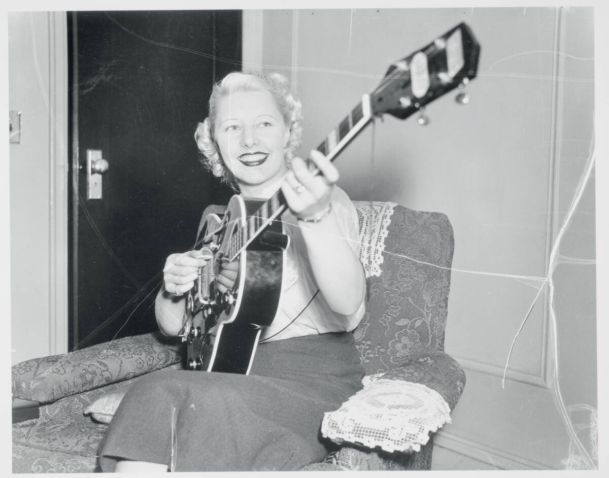 Woman Playing Electric Guitar