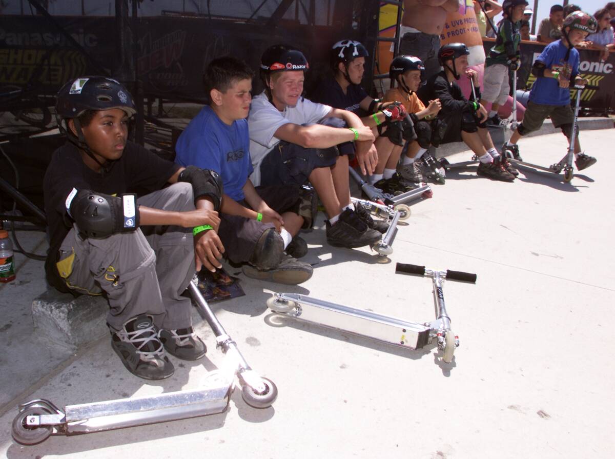 Young Razor scooter riderd wait their turn to compete in the Panasonic Shockwave Core Tour at Venice