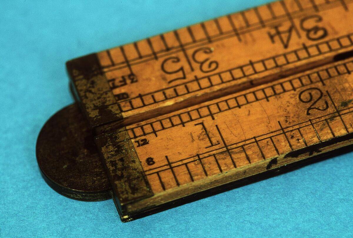 A wooden ruler displays inches and increments thereof, 12 July 2002. AFR Pictur