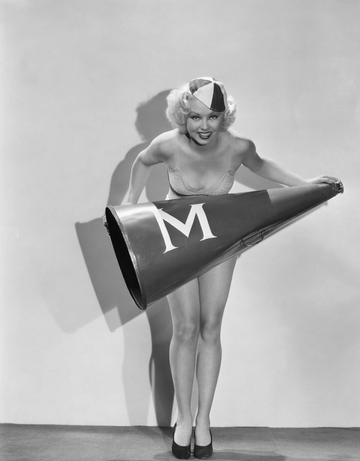 Actress Toby Wing Holding Cheerleading Megaphone in College Humor