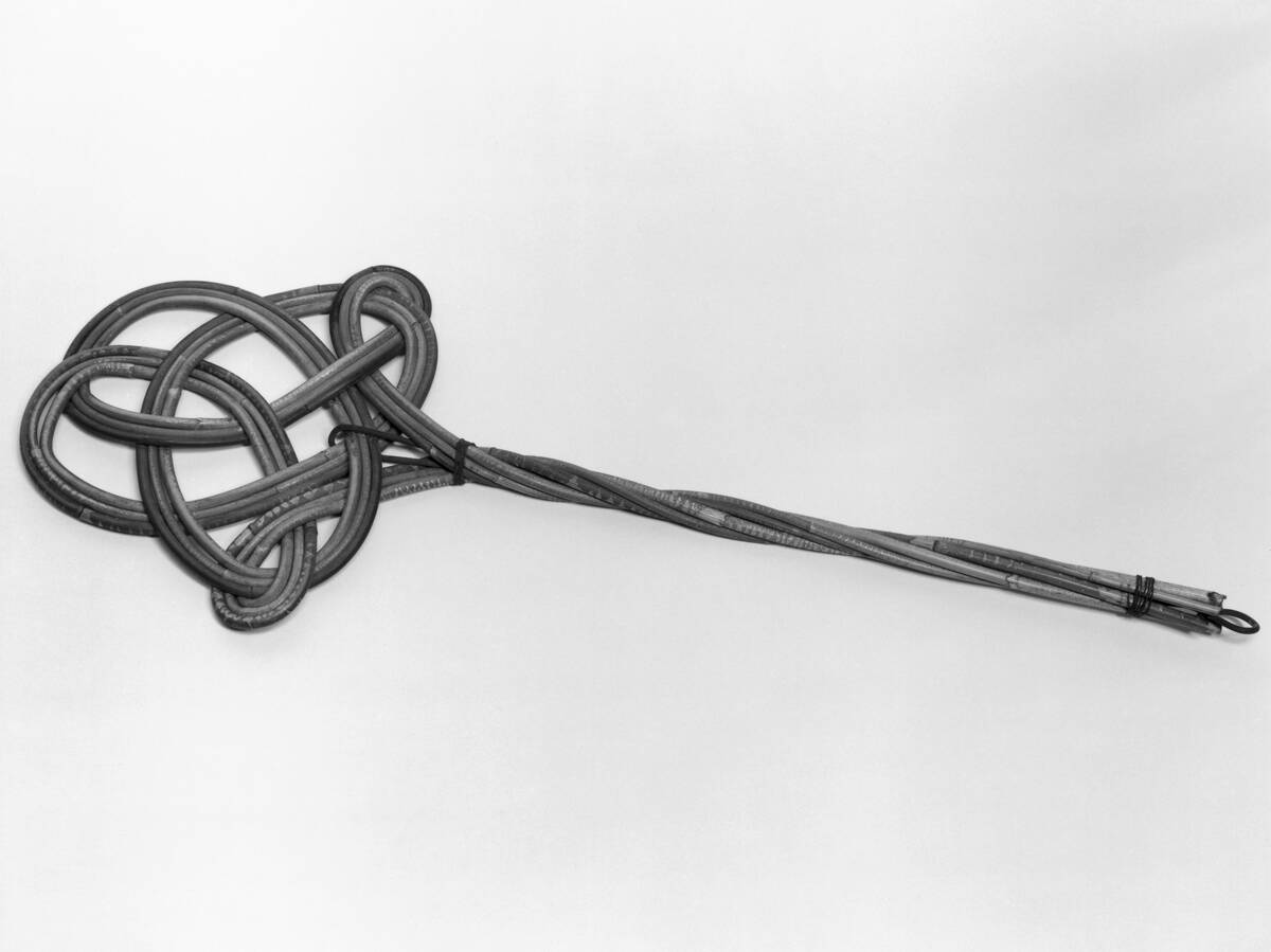 Cane carpet beater, English, 1880-1920.