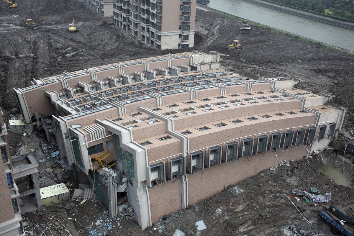 China - Shanghai - Nearly Finished 11 Story Apartment Building Topples Over