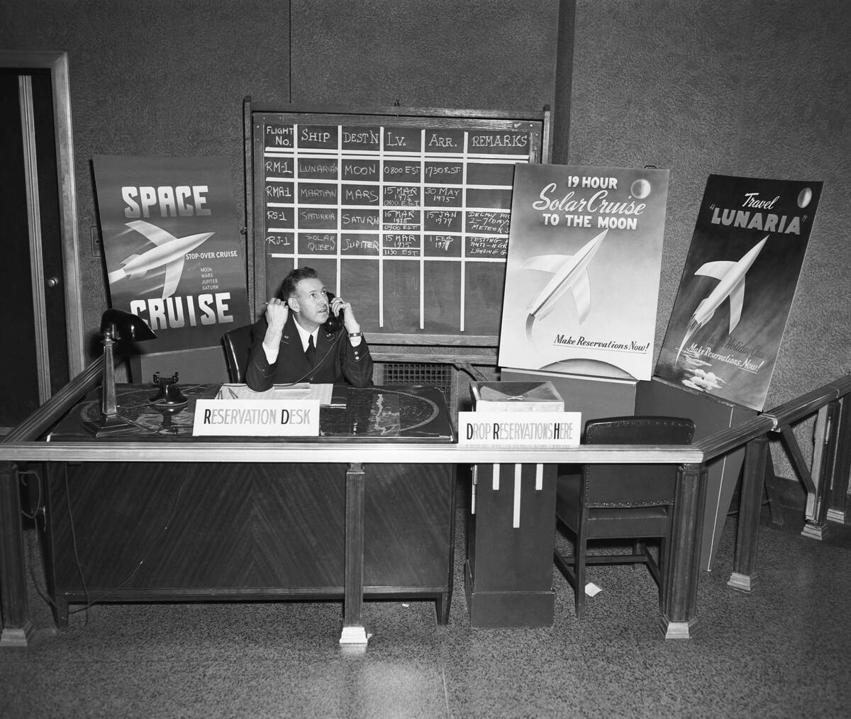 Clerk Taking Space Travel Reservations