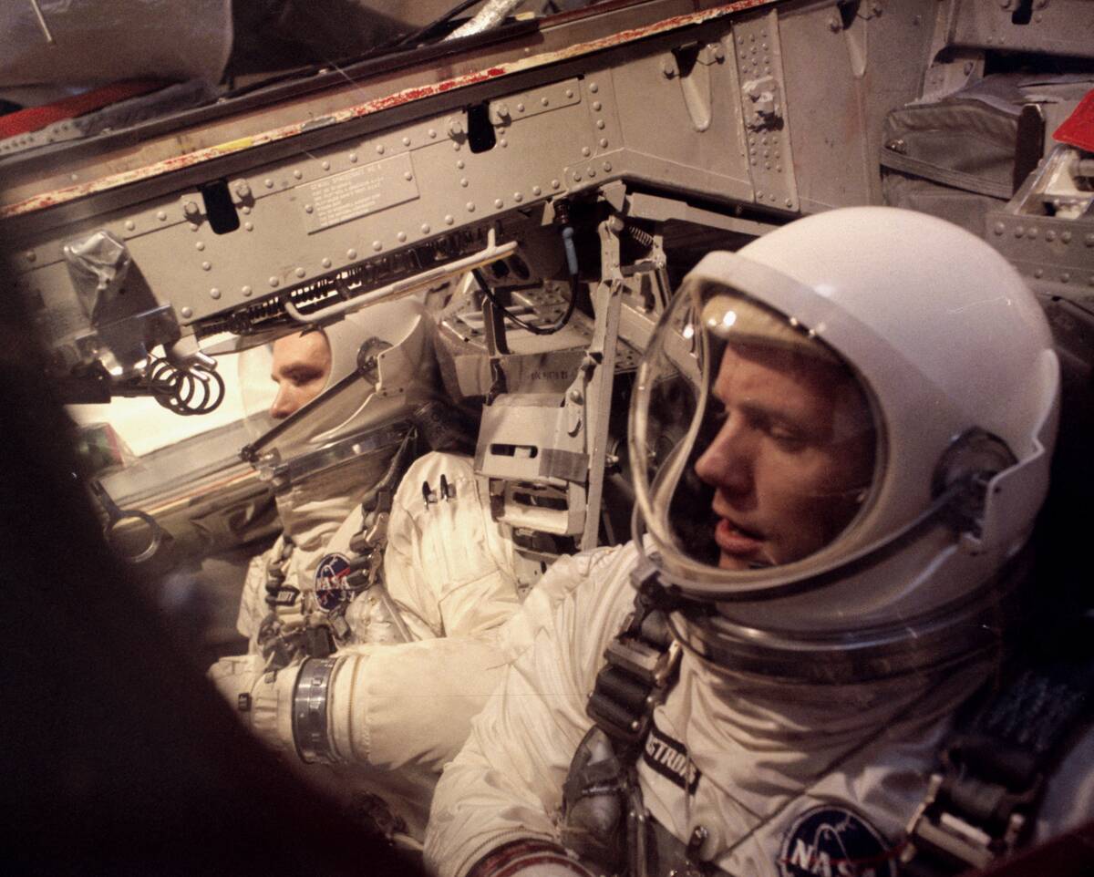 David Scott and Neil Armstong Sitting Inside Spacecraft