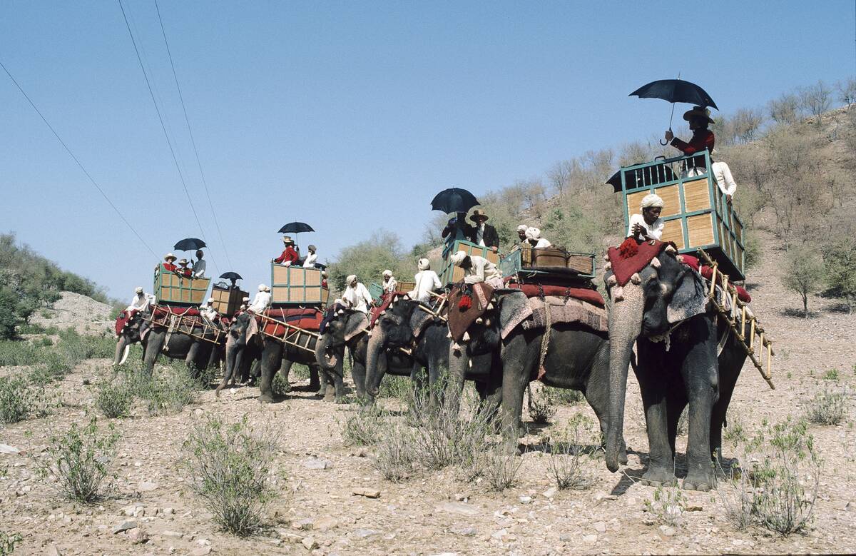 Elephant Caravan During The Filming Of 'The Deceivers'
