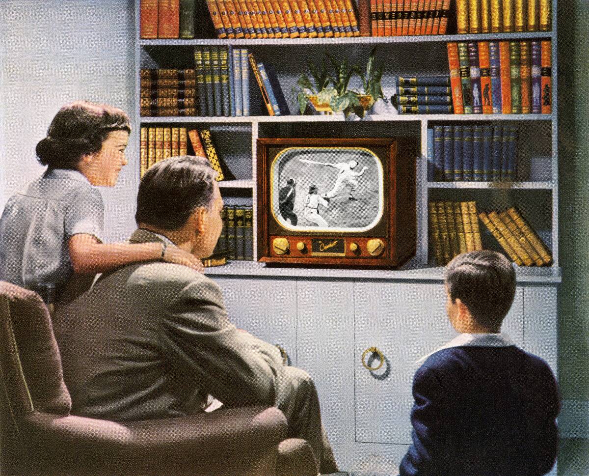Family Watching Baseball On Tv